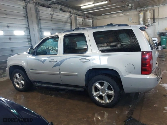 2009 Chevrolet Tahoe LT w/1LT with VIN 1GNFK23069R179124, listed as a IAAI auction lot 41578460 with 143,705 mi miles. Bid and sale history available at carsss.com. Image 14.