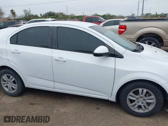 2012 Chevrolet Sonic LS z VIN 1G1JA5SH7C4212837, wystawiony jako IAAI lot #41509997 z przebiegiem 96 901 mil mil oraz . Historia ofert i sprzedaży dostępna na DreamBid. Obrazek 12.