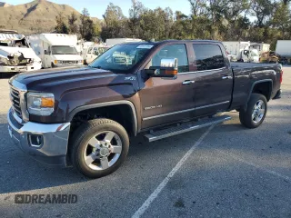 2016 GMC Sierra 2500HD SLT z VIN 1GT12TE80GF160336, wystawiony jako Copart lot #45910795 z przebiegiem 124 655 mil mil oraz Szkoda całkowita • Salvage title. Historia ofert i sprzedaży dostępna na DreamBid. Obrazek 1.
