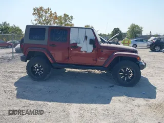 2008 Jeep Wrangler Unlimited Sahara with VIN 1J4GA591X8L537550, listed as a IAAI auction lot 40281739 with 145,388 mi miles and . Bid and sale history available at DreamBid. Image 13.