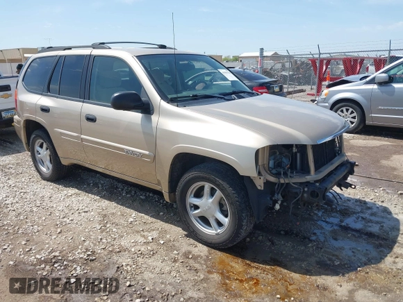 2005 GMC Envoy SLE with VIN 1GKDT13S252264932, listed as a IAAI auction lot 41981566 with 140,566 mi miles. Bid and sale history available at carsss.com. Image 1.