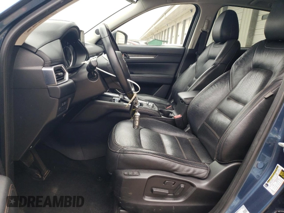 2018 Mazda CX-5 Grand Touring with VIN JM3KFADM8J1351624, listed as a Copart auction lot 50965465 with 66,210 mi miles and Salvage Title. Bid and sale history available at DreamBid. Image 7.