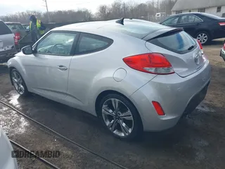2017 Hyundai Veloster with VIN KMHTC6AD2HU324740, listed as a IAAI auction lot 41574415 with 66,685 mi miles. Bid and sale history available at carsss.com. Image 3.