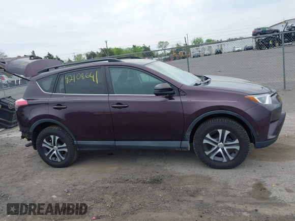 2018 Toyota RAV4 LE with VIN 2T3BFREV9JW771845, listed as a IAAI auction lot 42108641 with 127,394 mi miles. Bid and sale history available at carsss.com. Image 14.