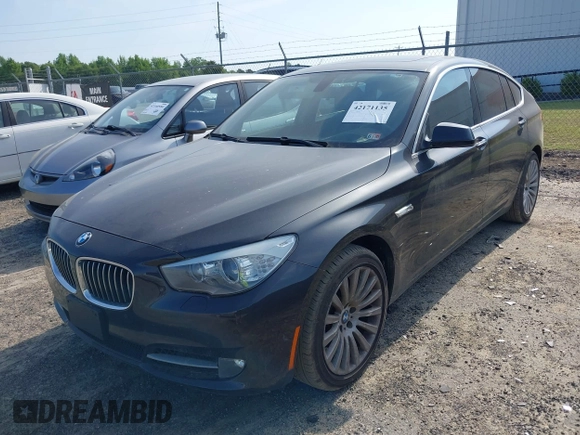 2013 BMW 5 Series GT 535i xDrive with VIN WBASP2C59DC339770, listed as a IAAI auction lot 42171135 with 106,625 mi miles. Bid and sale history available at carsss.com. Image 2.