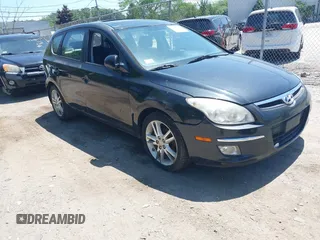 2009 Hyundai Elantra Touring with VIN KMHDC86E79U041964, listed as a IAAI auction lot 42583295 with 133,139 mi miles and . Bid and sale history available at DreamBid. Image 1.
