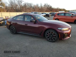 2022 BMW 4 Series M440i xDrive z VIN WBA13AW01NFM58124, wystawiony jako Copart lot #85731994 z przebiegiem 15 922 mil mil oraz Szkoda całkowita • Salvage title. Historia ofert i sprzedaży dostępna na DreamBid. Obrazek 4.