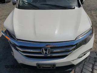 2018 Honda Pilot EX-L with VIN 5FNYF6H54JB013986, listed as a Copart auction lot 60743165 with 124,373 mi miles and Salvage title. Bid and sale history available at DreamBid. Image 12.