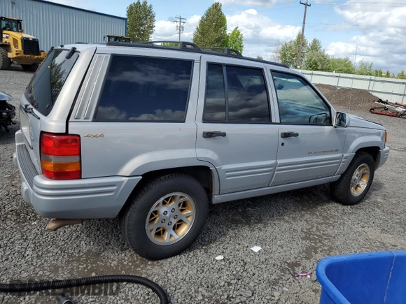 1998 Jeep Grand Cherokee Limited с VIN 1J4GZ78Y0WC245194, выставлен на аукционе Copart как лот 57838825 с пробегом 199 412 миль миль и Списание • Salvage title. История ставок и продаж доступна на DreamBid. Изображение 3.