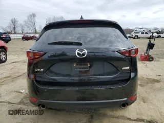 2017 Mazda CX-5 Touring with VIN JM3KFACLXH0195725, listed as a Copart auction lot 47464365 with 65,457 mi miles and Salvage Title. Bid and sale history available at carsss.com. Image 6.