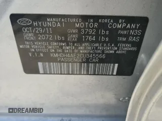 2012 Hyundai Elantra Limited z VIN KMHDH4AE2CU345566, wystawiony jako Copart lot #59151575 z przebiegiem 108 875 mil mil oraz Szkoda całkowita • Salvage title. Historia ofert i sprzedaży dostępna na DreamBid. Obrazek 12.