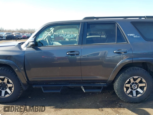 2021 Toyota 4Runner TRD Off Road Premium with VIN JTERU5JR0M5912797, listed as a IAAI auction lot 41796491 with 106,602 mi miles and . Bid and sale history available at DreamBid. Image 14.