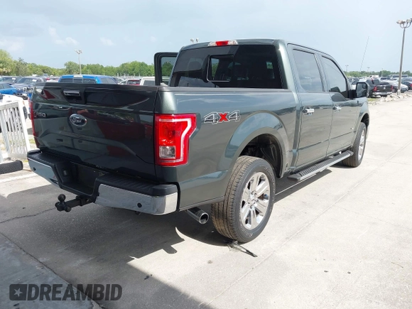 2015 Ford F-150 XLT with VIN 1FTEW1EG3FFB19022, listed as a IAAI auction lot 42452866 with 210,889 mi miles and . Bid and sale history available at DreamBid. Image 4.