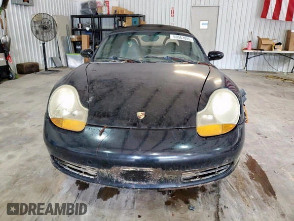 1999 Porsche Boxster z VIN WP0CA2988XU623383, wystawiony jako Copart lot #60567895 z przebiegiem Nie podano mil oraz Czysty tytuł • Clean title. Historia ofert i sprzedaży dostępna na DreamBid. Obrazek 5.