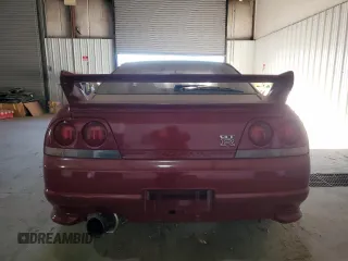 1997 Nissan Skyline z VIN BCNR33042682, wystawiony jako Copart lot #76562674 z przebiegiem 61 791 mil mil oraz Czysty tytuł • Clean title. Historia ofert i sprzedaży dostępna na DreamBid. Obrazek 6.