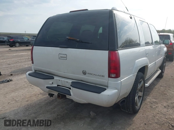 2000 Cadillac Escalade z VIN 1GYEK63R1YR207043, wystawiony jako IAAI lot #42139944 z przebiegiem 225 265 mil mil oraz . Historia ofert i sprzedaży dostępna na DreamBid. Obrazek 4.