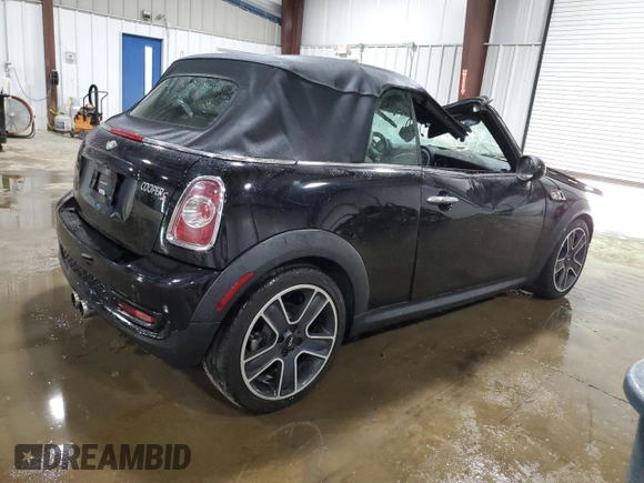 2013 MINI Convertible S with VIN WMWZP3C51DT297891, listed as a Copart auction lot 56745065 with 101,292 mi miles and Salvage title. Bid and sale history available at DreamBid. Image 3.