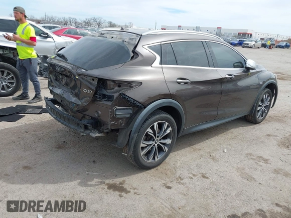 2017 Infiniti QX30 Premium with VIN SJKCH5CR7HA024635, listed as a IAAI auction lot 41764962 with 98,803 mi miles and . Bid and sale history available at DreamBid. Image 4.