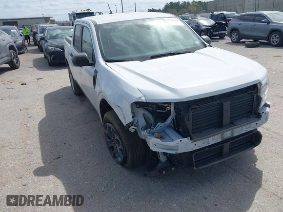 2023 Ford Maverick XL with VIN 3FTTW8E96PRA74020, listed as a IAAI auction lot 41782011 with 30,592 mi miles and . Bid and sale history available at DreamBid. Image 1.