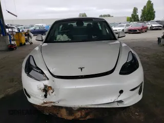 2022 Tesla Model 3 Long Range with VIN 5YJ3E1EB2NF267485, listed as a Copart auction lot 54952505 with 30,569 mi miles and Clean Title. Bid and sale history available at DreamBid. Image 5.