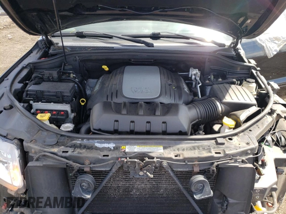 2013 Jeep Grand Cherokee Overland with VIN 1C4RJFCT2DC576125, listed as a Copart auction lot 52595165 with 100,361 mi miles and Salvage Title. Bid and sale history available at carsss.com. Image 12.