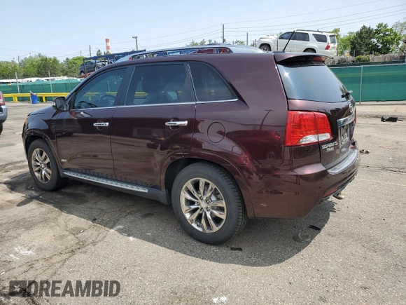 2013 Kia Sorento SX with VIN 5XYKWDA2XDG363999, listed as a Copart auction lot 58200985 with 69,056 mi miles and Salvage title. Bid and sale history available at DreamBid. Image 2.