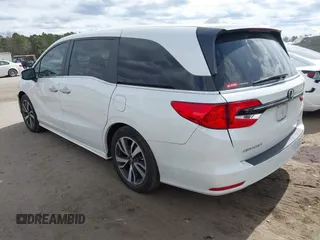 2022 Honda Odyssey Touring with VIN 5FNRL6H84NB062604, listed as a IAAI auction lot 41724006 with 41,351 mi miles and . Bid and sale history available at DreamBid. Image 3.