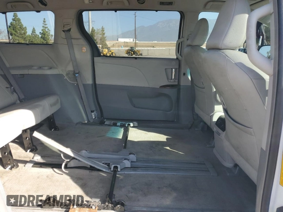 2013 Toyota Sienna XLE AAS with VIN 5TDYK3DC5DS322039, listed as a Copart auction lot 61657715 with 185,269 mi miles and Salvage title. Bid and sale history available at DreamBid. Image 11.