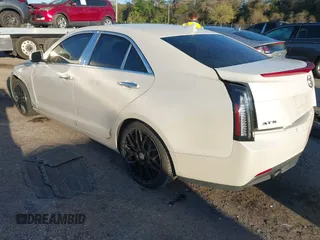 2014 Cadillac ATS Standard RWD z VIN 1G6AA5RA7E0128501, wystawiony jako IAAI lot #41780110 z przebiegiem 78 367 mil mil oraz . Historia ofert i sprzedaży dostępna na DreamBid. Obrazek 3.