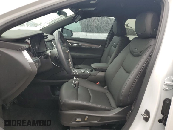 2022 Cadillac XT5 FWD Luxury z VIN 1GYKNAR48NZ163921, wystawiony jako Copart lot #74507874 z przebiegiem 5 723 mil mil oraz Nie do naprawy • Non repairable. Historia ofert i sprzedaży dostępna na DreamBid. Obrazek 7.