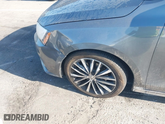 2016 Volkswagen Jetta Sport z VIN 3VWD17AJ0GM386504, wystawiony jako IAAI lot #42000125 z przebiegiem 90 405 mil mil oraz . Historia ofert i sprzedaży dostępna na DreamBid. Obrazek 6.