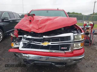 2014 Chevrolet Silverado 1500 LT with VIN 3GCUKREC9EG210621, listed as a IAAI auction lot 42011581 with Not Provided miles and . Bid and sale history available at DreamBid. Image 12.