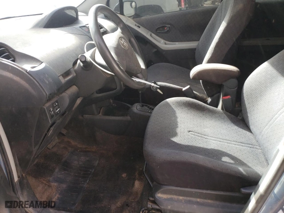 2009 Toyota Yaris with VIN JTDKT903195234291, listed as a Copart auction lot 46946795 with 152,625 mi miles and Salvage Title. Bid and sale history available at carsss.com. Image 7.