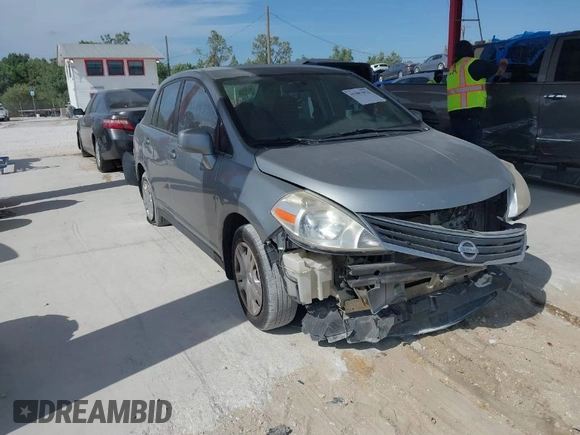 2010 Nissan Versa 1.8 S with VIN 3N1BC1AP0AL365397, listed as a IAAI auction lot 41987852 with 183,952 mi miles. Bid and sale history available at carsss.com. Image 1.