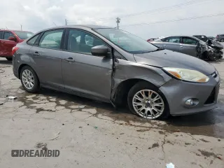 2012 Ford Focus SE z VIN 1FAHP3F22CL431070, wystawiony jako Copart lot #59569925 z przebiegiem 222 295 mil mil oraz Szkoda całkowita • Salvage title. Historia ofert i sprzedaży dostępna na DreamBid. Obrazek 4.