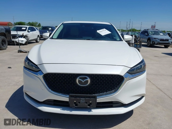 2021 Mazda 6 Touring with VIN JM1GL1VM4M1618686, listed as a IAAI auction lot 42079730 with 55,539 mi miles and . Bid and sale history available at DreamBid. Image 12.