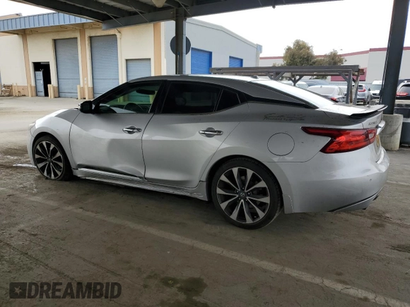 2016 Nissan Maxima SL with VIN 1N4AA6AP4GC416745, listed as a Copart auction lot 52789885 with 107,102 mi miles and Salvage Title. Bid and sale history available at DreamBid. Image 2.
