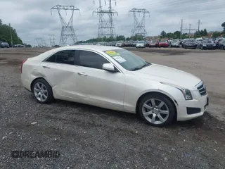 2014 Cadillac ATS Standard RWD with VIN 1G6AA5RA5E0173517, listed as a IAAI auction lot 42540181 with 73,732 mi miles and . Bid and sale history available at DreamBid. Image 6.