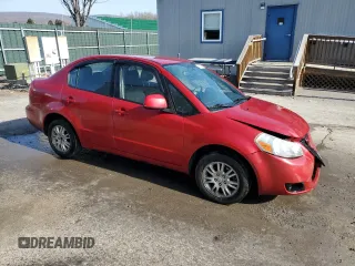 2012 Suzuki SX4 LE z VIN JS2YC5A34C6300969, wystawiony jako Copart lot #49036095 z przebiegiem 163 367 mil mil oraz Szkoda całkowita • Salvage title. Historia ofert i sprzedaży dostępna na DreamBid. Obrazek 4.