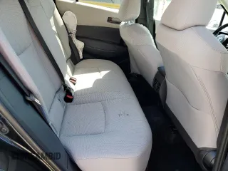 2024 Toyota Corolla Cross LE z VIN 7MUCAABG2RV103351, wystawiony jako Copart lot #53272015 z przebiegiem 24 743 mil mil oraz Szkoda całkowita • Salvage title. Historia ofert i sprzedaży dostępna na DreamBid. Obrazek 11.