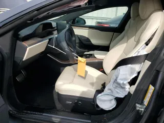 2022 Tesla Model S with VIN 5YJSA1E5XNF471212, listed as a Copart auction lot 57384025 with Not provided miles and Salvage title. Bid and sale history available at DreamBid. Image 7.
