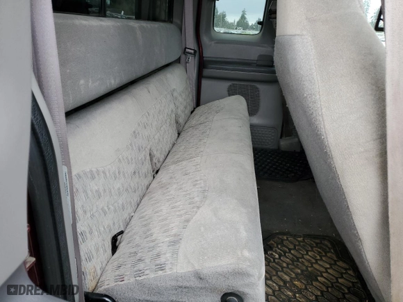 1999 Ford Super Duty F-250 XL with VIN 1FTNX20L1XEC32594, listed as a Copart auction lot 49801605 with 239,103 mi miles and Salvage Title. Bid and sale history available at carsss.com. Image 10.