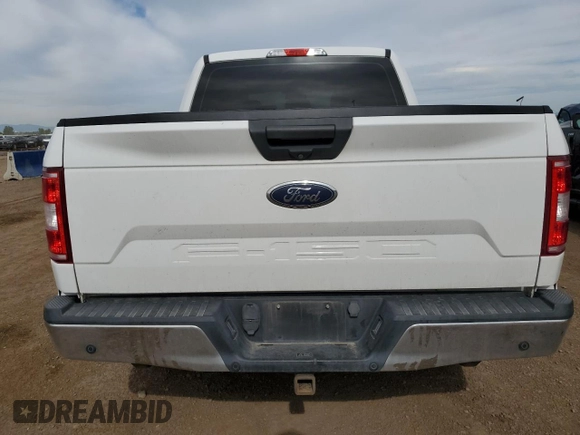 2018 Ford F-150 XL with VIN 1FTEW1E50JFC65370, listed as a Copart auction lot 59222655 with 213,487 mi miles and Salvage title. Bid and sale history available at DreamBid. Image 6.