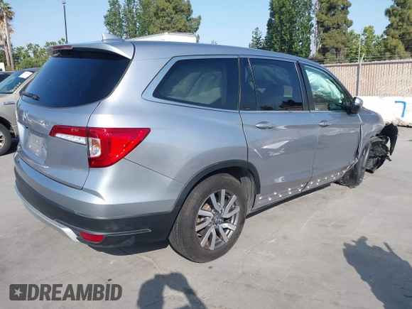2021 Honda Pilot EX with VIN 5FNYF5H37MB014384, listed as a IAAI auction lot 42412500 with 36,934 mi miles and . Bid and sale history available at DreamBid. Image 4.