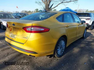 2015 Ford Fusion SE Hybrid with VIN 3FA6P0LU5FR255505, listed as a IAAI auction lot 42104362 with 399,115 mi miles. Bid and sale history available at carsss.com. Image 4.