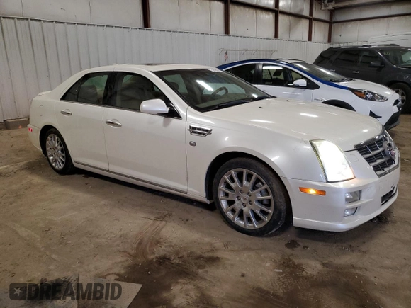 2010 Cadillac STS AWD z VIN 1G6DU6EV0A0106434, wystawiony jako Copart lot #52439915 z przebiegiem 90 187 mil mil oraz Czysty tytuł • Clean title. Historia ofert i sprzedaży dostępna na DreamBid. Obrazek 4.