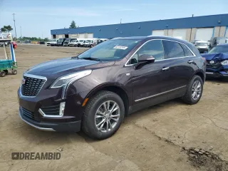 2021 Cadillac XT5 FWD Premium Luxury z VIN 1GYKNCRS9MZ217560, wystawiony jako Copart lot #60733295 z przebiegiem 52 242 mil mil oraz Szkoda całkowita • Salvage title. Historia ofert i sprzedaży dostępna na DreamBid. Obrazek 1.
