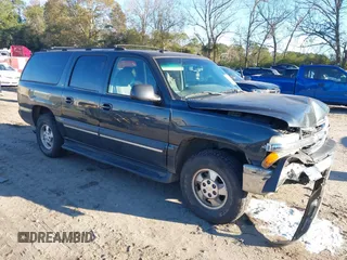 2003 Chevrolet Suburban LT with VIN 1GNEC16Z23J159956, listed as a IAAI auction lot 40920994 with 255,603 mi miles and . Bid and sale history available at DreamBid. Image 1.