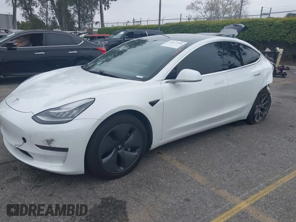 2020 Tesla Model 3 Long Range with VIN 5YJ3E1EB0LF803217, listed as a IAAI auction lot 41871940 with 130,391 mi miles. Bid and sale history available at carsss.com. Image 19.