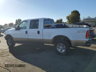 2000 Ford Super Duty F-250 XL with VIN 1FTNW21S1YED65639, listed as a Copart auction lot 74377194 with 158,387 mi miles and Salvage Title. Bid and sale history available at carsss.com. Image 2.